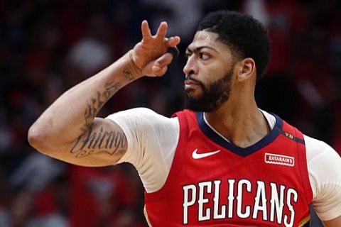 New Orleans Pelicans forward Anthony Davis reacts after making a 3-point shot during the first half of Game 4 of the team's first-round NBA basketball playoff series against the Portland Trail Blazers in New Orleans, Saturday, April 21, 2018. (AP Photo/Scott Threlkeld)