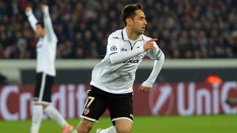 Valencia's Brazilian forward Jonas (R) celebrates after scoring during the UEFA Champions League round of 16 second leg football match Paris Saint-Germain vs Valencia, on March 6, 2013 at the Parc-des-Princes stadium in Paris.                     AFP PHOTO / MIGUEL MEDINA        (Photo credit should read MIGUEL MEDINA/AFP/Getty Images)