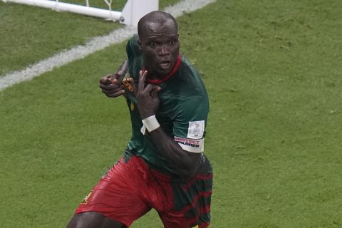 Cameroon's Vincent Aboubakar celebrates after scoring his side's opening goal during the World Cup group G soccer match between Cameroon and Brazil, at the Lusail Stadium in Lusail, Qatar, Friday, Dec. 2, 2022. (AP Photo/Alessandra Tarantino)