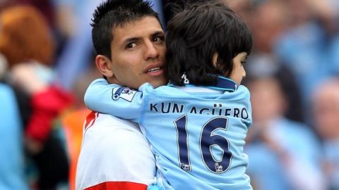 MANCHESTER, ENGLAND - MAY 13:  Sergio Aguero of Manchester City celebrates with his daughter following the Barclays Premier League match between Manchester City and Queens Park Rangers at the Etihad Stadium on May 13, 2012 in Manchester, England.  (Photo by Alex Livesey/Getty Images)