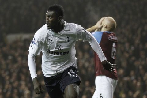 Tottenham Hotspur's Togolese player Emmanuel Adebayor celebrates scoring his goal during an English Premier League football match between Tottenham Hotspur and Aston Villa at White Hart Lane in London, England, on November 21, 2011. AFP PHOTO/IAN KINGTON

RESTRICTED TO EDITORIAL USE. No use with unauthorised audio, video, data, fixture lists, club/league logos or live services. Online in-match use limited to 45 images, no video emulation. No use in betting, games or single club/league/player publications. (Photo credit should read IAN KINGTON/AFP/Getty Images)