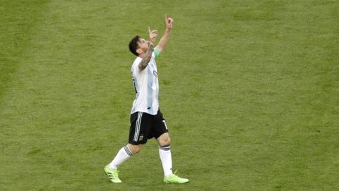 Argentina's Lionel Messi celebrates after scoring the opening goal during the group D match between Argentina and Nigeria, at the 2018 soccer World Cup in the St. Petersburg Stadium in St. Petersburg, Russia, Tuesday, June 26, 2018. (AP Photo/Michael Sohn)