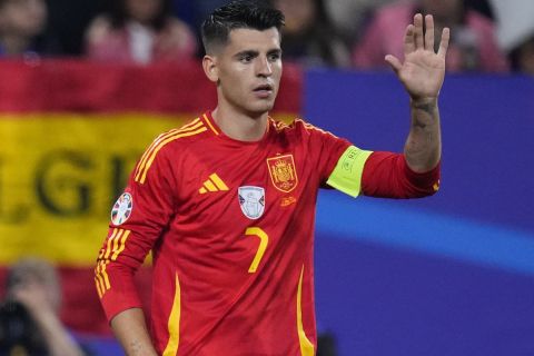 Spain's Alvaro Morata (7) and Fabian Ruiz celebrate an own goal by Italy during a Group B match between Spain and Italy at the Euro 2024 soccer tournament in Gelsenkirchen, Germany, Thursday, June 20, 2024. (AP Photo/Manu Fernandez)