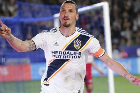 LA Galaxy forawrd Zlatan Ibrahimovic (9) of Sweden, celebrates his goal against Chicago Fire during an MLS soccer match between LA Galaxy and Chicago Fire in Carson, Calif., Saturday, March 2, 2019. The Galaxy won 2-1. (AP Photo/Ringo H.W. Chiu)