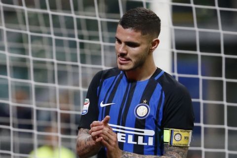 Inter Milan's Mauro Icardi reacts after missing a scoring chance during the Serie A soccer match between Inter Milan and Cagliari at the San Siro stadium in Milan, Italy, Tuesday, April 17, 2018. (AP Photo/Antonio Calanni)