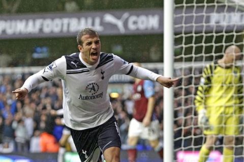 Tottenham Hotspur's Dutch midfielder Rafael Van der Vaart celebrates scoring his goal during the English Premier League football match between Tottenham Hotspur and Aston Villa at White Hart Lane in north London, England on October 2, 2010. AFP PHOTO/IAN KINGTON  FOR EDITORIAL USE ONLY Additional licence required for any commercial/promotional use or use on TV or internet (except identical online version of newspaper) of Premier League/Football League photos. Tel DataCo +44 207 2981656. Do not alter/modify photo. (Photo credit should read IAN KINGTON/AFP/Getty Images)