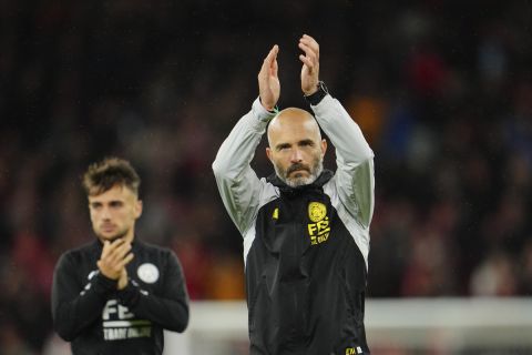 Leicester's head coach Enzo Maresca applauds fans at the end of the English League Cup third round soccer match between Liverpool and Leicester City at the Anfield stadium in Liverpool, England, Wednesday, Sept. 27, 2023. (AP Photo/Jon Super)