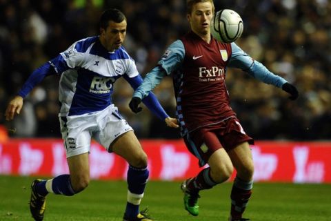 Aston Villa's English defender Luke Young (R) pulls away from Birmingham City's Irish midfeidler Keith Fahey during the English Football League Cup football match betwen Birmingham City and Aston Villa at St Andrews in Birmingham, central England, on December 1, 2010. AFP PHOTO/PAUL ELLIS - FOR EDITORIAL USE ONLY Additional licence required for any commercial/promotional use or use on TV or internet (except identical online version of newspaper) of Premier League/Football League photos. Tel DataCo +44 207 2981656. Do not alter/modify photo.                                                                                                              Aston Villa's English defender Luke Young (R) pulls away from Birmingham City's Irish midfeidler Keith Fahey during the English Football League Cup football match betwen Birmingham City and Aston Villa at St Andrews in Birmingham, central England, on December 1, 2010. AFP PHOTO/PAUL ELLIS -  FOR EDITORIAL USE ONLY Additional licence required for any commercial/promotional use or use on TV or internet (except identical online version of newspaper) of Premier League/Football League photos. Tel DataCo +44 207 2981656. Do not alter/modify photo. (Photo credit should read PAUL ELLIS/AFP/Getty Images)