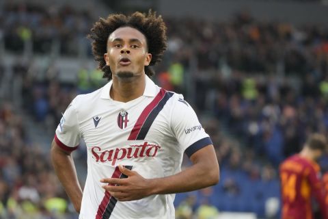 Bologna's Joshua Zirkzee celebrates after scoring the second goal against Roma during the Italian Serie A soccer match between Roma and Bologna at Rome's Olympic Stadium, Monday, April 22, 2024. (AP Photo/Gregorio Borgia)