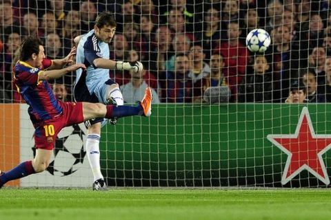 Barcelona's Argentinian forward Lionel Messi (L) vies with Real Madrid's goalkeeper Iker Casillas  (R) during the Champions League semi-final second leg football match between Barcelona and Real Madrid at the Camp Nou stadium in Barcelona on May 3, 2011.   AFP PHOTO/ JOSEP LAGO (Photo credit should read JOSEP LAGO/AFP/Getty Images)