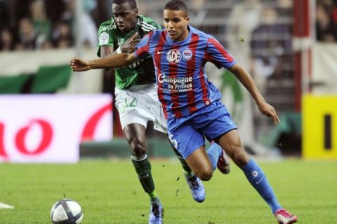 Caen's French forward Youssef El Arabi (L) fights for the ball with Saint-Etienne's French midfielder Blaise Matuidi (R) during the French L1 football match Saint-Etienne versus Caen on October 23, 2010 at the Geoffroy Guichard stadium in Saint-Etienne, southeastern France.  AFP PHOTO/PHILIPPE DESMAZES (Photo credit should read PHILIPPE DESMAZES/AFP/Getty Images)