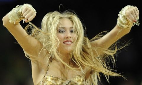 A cheerleader performs during the quarterfinal match between Spain and Slovenia during the EuroBasket2011 in Kaunas on September 14, 2011. AFP PHOTO/JOE KLAMAR (Photo credit should read JOE KLAMAR/AFP/Getty Images)