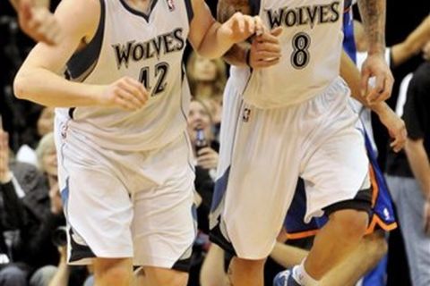 Minnesota Timberwolves' Kevin Love, left, is congratulated by Michael Beasley after a shot in the second half of an NBA basketball game Friday, Nov. 12, 2010 in Minneapolis. Love scored 31 points and had 31 rebounds while Beasley scored 35 to lead the Timberwolves in their 112-103 win over the New York Knicks.  (AP Photo/Jim Mone)