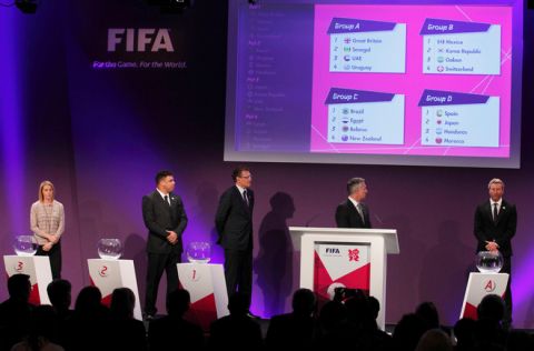 (L-R) English footballer Kelly Smith, former Brazilian footballer Ronaldo, FIFA General Secretary Jerome Valcke, former England footballer Gary Lineker and former Welsh footballer Robbie Savage conduct the draw for the London 2012 Olympic football tournament at Wembley Stadium in London, on April 24, 2012. Host nation Great Britain will kick off the Olympic football tournament against Senegal at Manchester United's Old Trafford ground on July 26 following the draw made at Wembley. AFP PHOTO / JUSTIN TALLIS (Photo credit should read JUSTIN TALLIS/AFP/Getty Images)