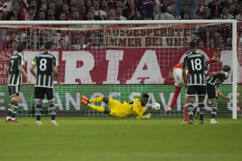 Bayern's Leroy Sane, third right, scores his side's opening goal during the Champions League group A soccer match between Bayern Munich and Manchester United at the Allianz Arena stadium in Munich, Germany, Wednesday, Sept. 20, 2023. (AP Photo/Matthias Schrader)