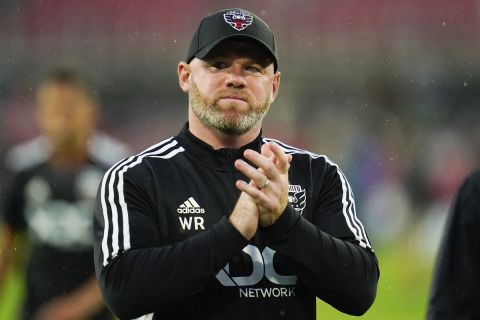 D.C. United head coach Wayne Rooney reacts after an MLS soccer match against Orlando City, Sunday, July 31, 2022, in Washington. D.C. United won 2-1. (AP Photo/Julio Cortez)