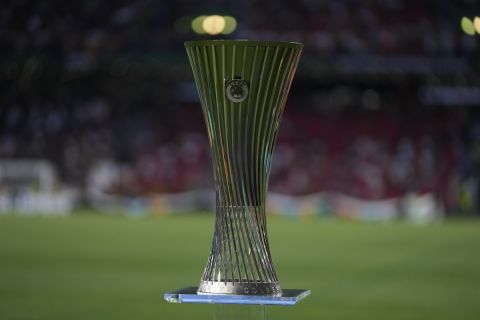 The Europa Conference League trophy is displayed on the pitch before the Europa Conference League final soccer match between AS Roma and Feyenoord at National Arena in Tirana, Albania, Wednesday, May 25, 2022. (AP Photo/Thanassis Stavrakis)