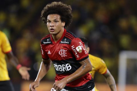 Willian Arao of Brazil's Flamengo eyes the ball during a Copa Libertadores semifinal second leg soccer match against Ecuador's Barcelona at Monumental stadium in Guayaquil, Ecuador, Wednesday, Sept. 29, 2021. (Franklin Jacome/Pool via AP)