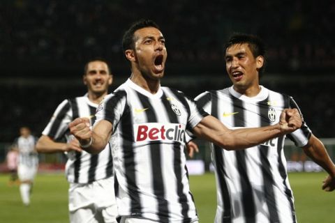 Juventus's forward Fabio Quagliarella celebrates after scoring during the Italian Serie A football match Palermo vs Juventus on April 7, 2012 at Barbera Stadium in Palermo. AFP PHOTO / MARCELLO PATERNOSTRO (Photo credit should read MARCELLO PATERNOSTRO/AFP/Getty Images)