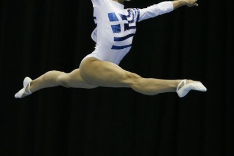 Vasiliki Millousi of Greece performs on the beam during the Senior women's qualification round of the European Artistic Gymnastics Team Championships 2010 held at the National Indoor Arena, in Birmingham, on April 29, 2010. AFP PHOTO/ GLYN KIRK (Photo credit should read GLYN KIRK/AFP/Getty Images)