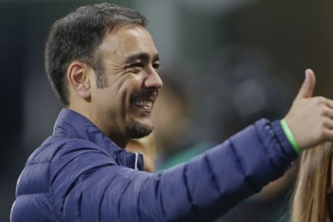 Inter former player Alvaro Recoba gestures during a Serie A soccer match between Inter Milan and AC Milan, at the San Siro stadium in Milan, Italy, Sunday, Sept.13, 2015. (AP Photo/Luca Bruno)