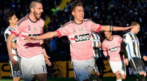 UDINE, ITALY - JANUARY 17:  Paulo Dybala (R) of Juventus FC celebrates after scoring his team's third goal from the penalty spot during the Serie A match between Udinese Calcio and Juventus FC at Stadio Friuli on January 17, 2016 in Udine, Italy.  (Photo by Dino Panato/Getty Images)