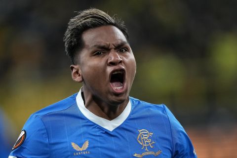 Rangers' Alfredo Morelos recast after scoring during the Europa League Play-off, 1st leg soccer match between Borussia Dortmund and Rangers in Dortmund, Germany, Thursday, Feb. 17, 2022. (AP Photo/Martin Meissner)