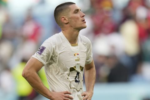 Serbia's Nikola Milenkovic gestures at the end of the World Cup group G soccer match between Cameroon and Serbia, at the Al Janoub Stadium in Al Wakrah, Qatar, Monday, Nov. 28, 2022. (AP Photo/Francisco Seco)