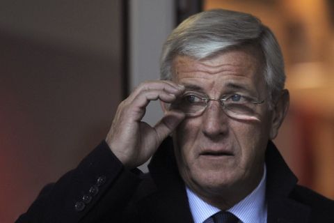 The former head coach of the Italian National football Team, Marcello Lippi, takes place before the Italian Serie A football match AC Milan vs Palermo, on November 10, 2010 in San Siro stadium in Milan. AFP PHOTO / OLIVIER MORIN (Photo credit should read OLIVIER MORIN/AFP/Getty Images)