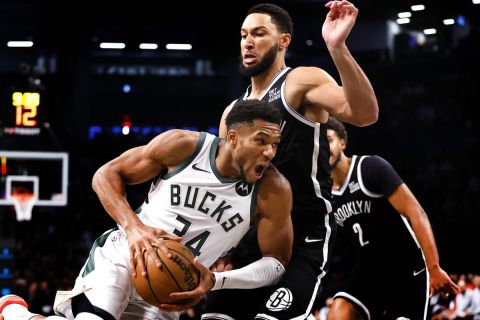 Milwaukee Bucks forward Giannis Antetokounmpo (34) drives to the basket against Brooklyn Nets guard Ben Simmons (10) during the second half of an NBA basketball game, Sunday, Oct. 27, 2024, in New York. (AP Photo/Noah K. Murray)