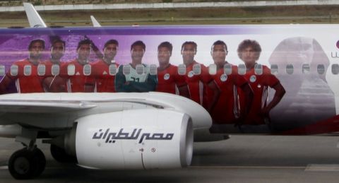 A plane with the Egypt national soccer team lands at an airport outside Grozny, Russia, Sunday, June 10, 2018 to compete in the 2018 World Cup in Russia. The 21st World Cup begins on Thursday, June 14, 2018, when host Russia takes on Saudi Arabia. (AP Photo/Musa Sadulayev)