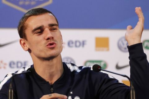 France's Antoine Griezmann reacts to a journalist's question during a press conference at the 2018 soccer World Cup in Istra, Russia, Friday, July 13, 2018. (AP Photo/David Vincent)