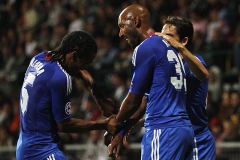 ZILINA, SLOVAKIA - SEPTEMBER 15:  Nicolas Anelka of Chelsea (C) celebrates with Florent Malouda (L) and Yossi Benayoun scores their second goal during the UEFA Champions League Group F match between MSK Zilina and Chelsea at the Pod Dubnom Stadium on September 15, 2010 in Zilina, Slovakia.  (Photo by Hamish Blair/Getty Images)