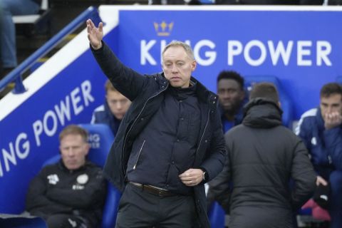 Leicester's head coach Steve Cooper gestures during the English Premier League soccer match between Leicester City and Chelsea at King Power stadium in Leicester, England, Saturday, Nov. 23, 2024. (AP Photo/Dave Shopland)