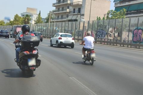 Δίκυκλιστης χωρίς κράνος, Εθνική Οδός