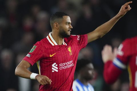 Liverpool's Cody Gakpo celebrates after scoring during the English League Cup soccer match between Brighton and Liverpool at Falmer Stadium in Brighton, England, Wednesday, Oct. 30, 2024. (AP Photo/Dave Shopland)