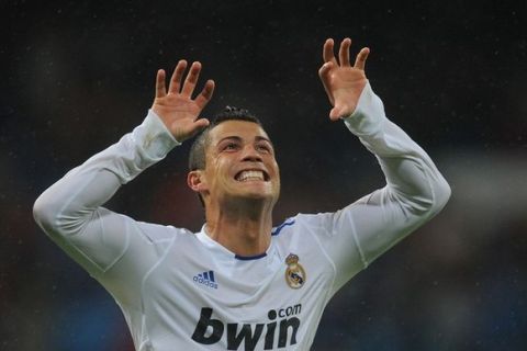 MADRID, SPAIN - OCTOBER 03:  Cristiano Ronaldo of Real Madrid celebrates after scoring Real's sixth goal during the La Liga match between Real Madrid and Deportivo La Coruna at Estadio Santiago Bernabeu on October 3, 2010 in Madrid, Spain.  (Photo by Denis Doyle/Getty Images)