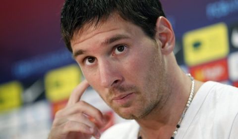 FC Barcelona's player Lionel Messi attends a news conference at Joan Gamper training Camp, near Barcelona July 18, 2012. REUTERS/Stringer (SPAIN - Tags: SPORT SOCCER)