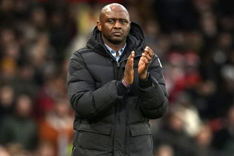 Crystal Palace's head coach Patrick Vieira applauds during the English Premier League soccer match between Manchester United and Crystal Palace, at the Old Trafford stadium in Manchester, England, Saturday, Feb. 4, 2023. (AP Photo/Dave Thompson)