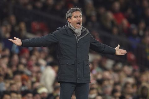 FILE - Young Boys' head coach David Wagner shouts out during the Champions League group F soccer match between Manchester United and Young Boys, at Old Trafford stadium in Manchester, England, Wednesday, Dec. 8, 2021. Beating Manchester United in the Champions League has proved to be the peak of David Wagners nine months coaching Young Boys. Wagner was fired Monday, March 7, 2022 by the four-time defending Swiss champion. (AP Photo/Dave Thompson, File)