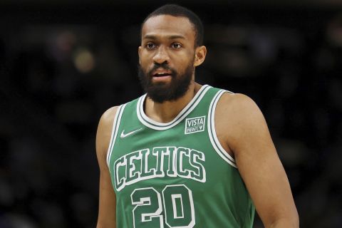 Boston Celtics forward Jabari Parker (20) looks on during the second half of an NBA basketball game against the Milwaukee Bucks Saturday, Dec. 25, 2021, in Milwaukee. The Milwaukee Bucks won 117-113. (AP Photo/Jon Durr)