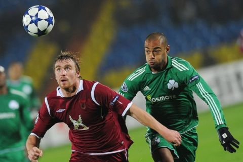 Cedric Kante (R) of FC Panathinaikos vies with Sergei Kornilenko of  Rubin Kazan during their UEFA Champions League goup D football match  in Kazan on November 02, 2010. AFP PHOTO/NATALIA KOLESNIKOVA (Photo credit should read NATALIA KOLESNIKOVA/AFP/Getty Images)