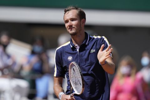 Russia's Daniil Medvedev celebrates after defeating Kazakhstan's Alexander Bublik during following their first round match on day two of the French Open tennis tournament at Roland Garros in Paris, France, Monday, May 31, 2021. (AP Photo/Thibault Camus)