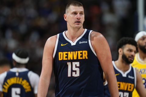 Denver Nuggets center Nikola Jokic (15) in the second half of Game 5 of an NBA basketball first-round playoff series Monday, April 29, 2024, in Denver. (AP Photo/David Zalubowski)