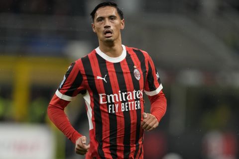 AC Milan's Tijjani Reijnders runs during the Serie A soccer match between AC Milan and Udinese at the San Siro stadium, in Milan, Italy, Saturday, Oct. 19, 2024. (AP Photo/Antonio Calanni)