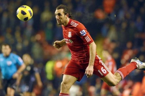 Liverpool's Greek defender Sotirios Kyrgiakos controls the ball during the English Premier League football match against Aston Villa at Anfield in Liverpool on December 6, 2010.  Liverpool beat the Frenchman's Aston Villa side 3-0 in the Premier League. AFP PHOTO/PAUL ELLIS -  FOR EDITORIAL USE ONLY Additional licence required for any commercial/promotional use or use on TV or internet (except identical online version of newspaper) of Premier League/Football League photos. Tel DataCo +44 207 2981656. Do not alter/modify photo. (Photo credit should read PAUL ELLIS/AFP/Getty Images)