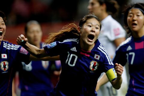 FRANKFURT AM MAIN, GERMANY - JULY 17:  Homare Sawa of Japan celebrates scoring the second goal during the FIFA Women's World Cup Final match between Japan and USA at the FIFA World Cup stadium Frankfurt on July 17, 2011 in Frankfurt am Main, Germany.  (Photo by Friedemann Vogel/Getty Images)