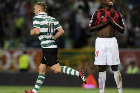 Sporting's Russian midfielder Marat Izmailov (L) runs after scoring a goal during the Portuguese league football match Sporting Lisbon vs Olhanense at the Alvalade Stadium in Lisbon on August 13, 2011.   AFP PHOTO / FRANCISCO LEONG (Photo credit should read FRANCISCO LEONG/AFP/Getty Images)