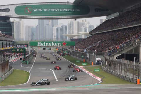 Drivers prepare for the start of the Chinese Formula One Grand Prix at the Shanghai International Circuit in Shanghai on Sunday, April 14, 2019. (AP Photo/Ng Han Guan)