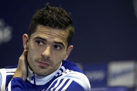 Fernando Gago, of a Argentinas's national soccer team, listens to questions from the media during a press conference at Cidade do Galo Center, in Vespasiano, Brazil, Thursday, June 26, 2014. Argentina, after its third straight win, had Messi put on a World Cup show with two goals, but this time his whole team  aside from a couple of defensive blunders  was part of the performance. (AP Photo/Bruno Magalhaes)